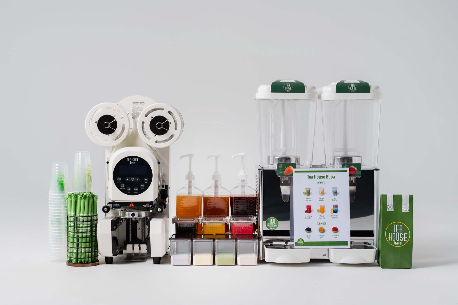 Full Tea House Boba drinks station with dispensers, syrups, cups and toppings